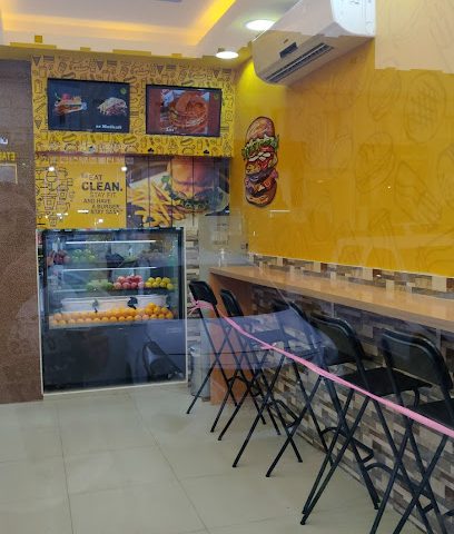 عالم البرجر - الوكير - +974 7444 9056
